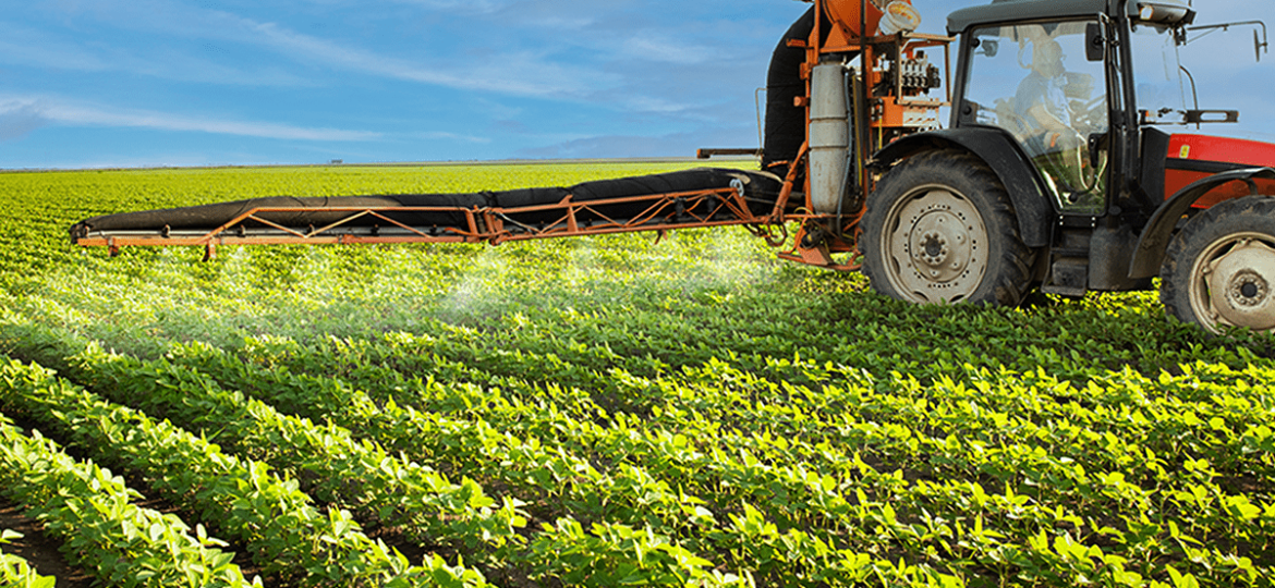 Ag industry case study of farmer in tractor spraying fields